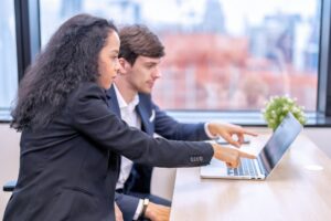 Staff employee sitting in work place